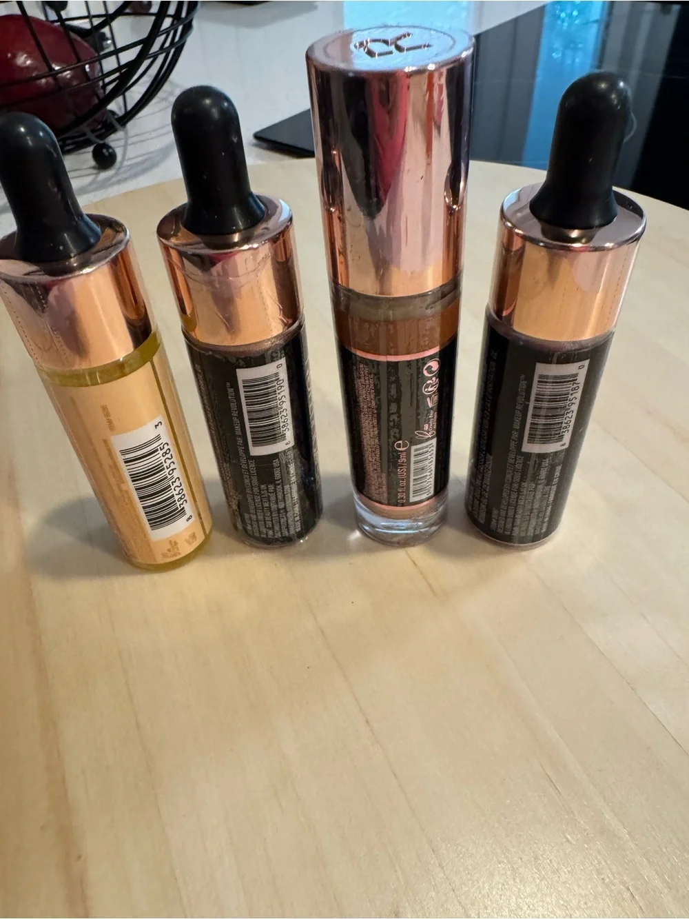 Revolution Concealer, Liquid Highlighters, and Baking Oil. All 4 included. NWT